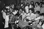 Author Victor Bockris plays tip the table at the Mudd Club on White St., NYC 07/17/1979<br>SN 2674-12a