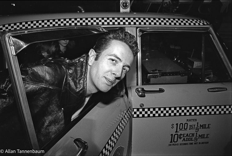 The Clash arrive - Joe Strummer in taxi